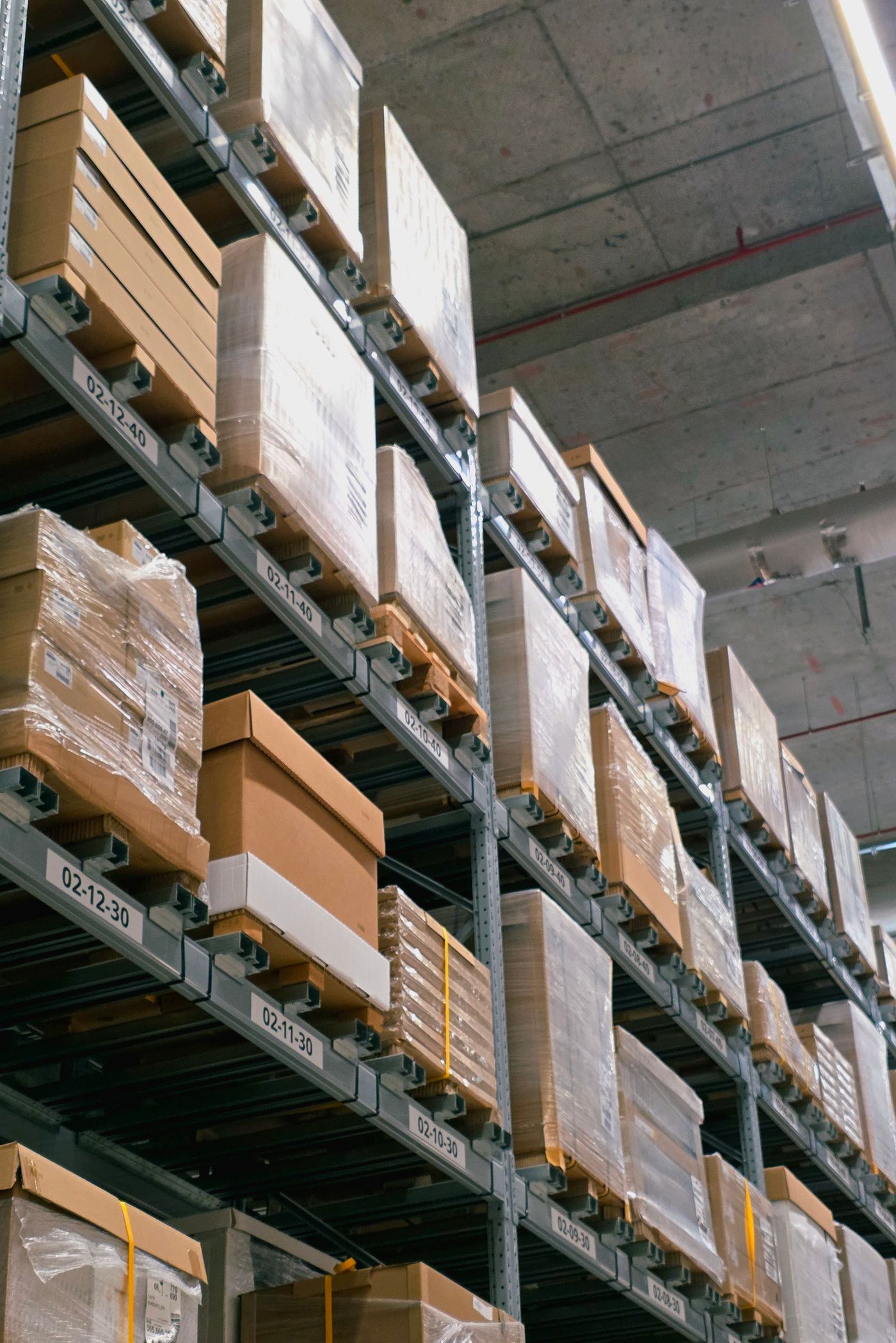 Organized warehouse shelves filled with cartons