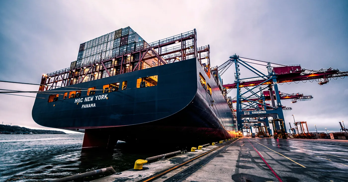 Container vessel alongside a cargo terminal
